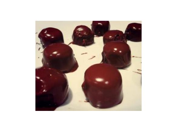 Raw cashew, cacao and coconut oil truffle coated in dark chocolate