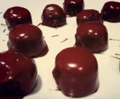 Raw cashew, cacao and coconut oil truffle coated in dark chocolate