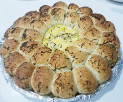 Tear and share brie, garlic + herb bread wreath