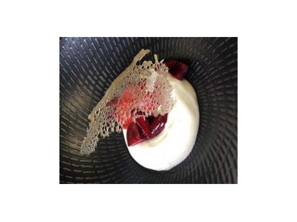 Risagolo (fancy rice pudding) with cherry sauce