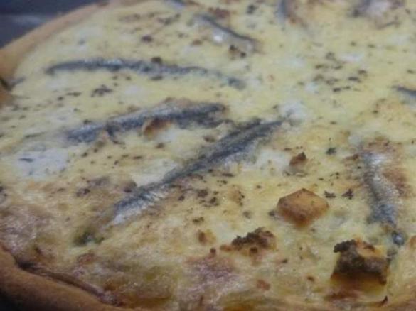 Goats cheese, onion jam and white anchovy tart