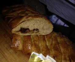 Whole rye and pumkin seed oil plaited bread with apple, walnut and pepper-berry filling