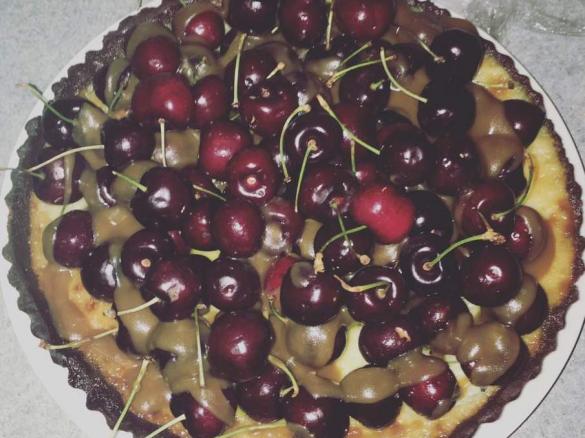 White Chocolate Tart with Caramel Sauce and Fresh Cherries