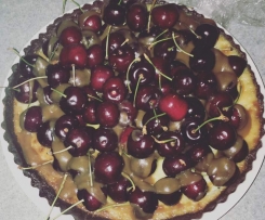 White Chocolate Tart with Caramel Sauce and Fresh Cherries