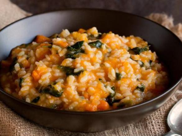 Pumpkin and chicken risotto with spinach and pinenuts