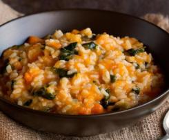 Pumpkin and chicken risotto with spinach and pinenuts