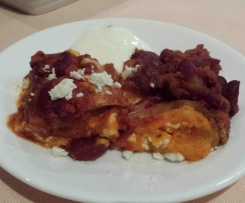 Eggplant Cannelloni filled with Feta & Pumpkin, topped with a Huevos Rancheros Sauce