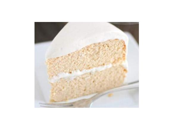 Moist white chocolate and vanilla birthday cake with cream cheese icing