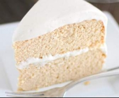 Moist white chocolate and vanilla birthday cake with cream cheese icing