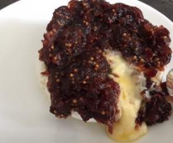 Warm Brie Topped with Red Onion and Cranberry Relish 