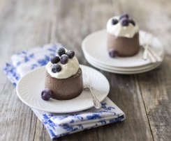 Baked chocolate ricotta with blueberries and cream