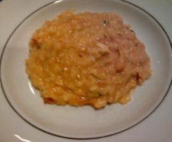 Meatlovers risotto with tomato and basil