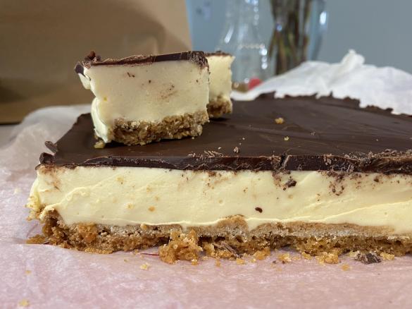 Passionfruit marshmallow dark chocolate slice.