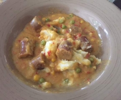 Coconut curry sausages with Mash potato