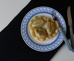 Pierogi with saurkraut and mushroom filling
