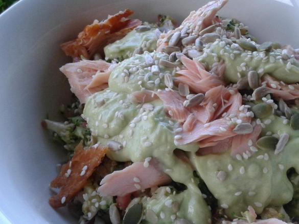 RAW BROCCOLI SALAD TOSSED WITH SMOKED SALMON, BLACK OLIVES AND CREAMY AVOCADO DRESSING