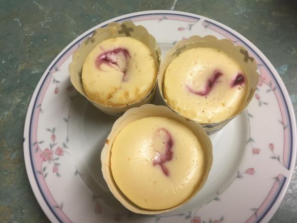 Raspberry Swirl Cheesecakes