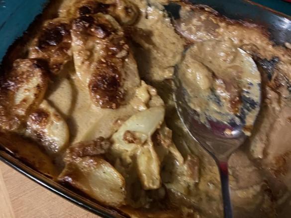 Vegan potato bake with browned onions