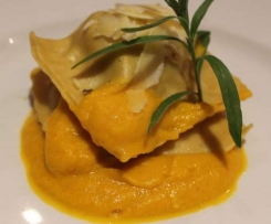 chicken and mushroom ravioli with a carrot, preserved lemon and tarragon sauce