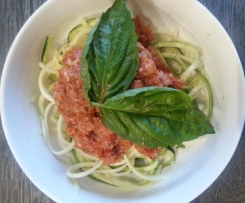 raw 'spaghetti' with a tomato 'bolognese' 