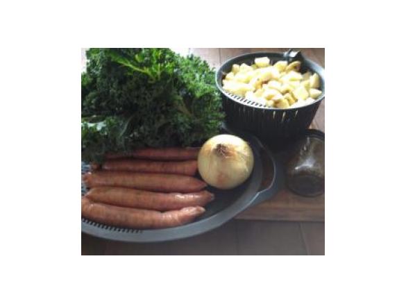 Traditional Dutch winter recipe 'Boerenkool met worst" "Kale with mash and sausages"