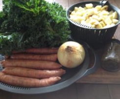 Traditional Dutch winter recipe 'Boerenkool met worst" "Kale with mash and sausages"
