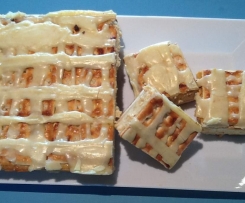 Salted caramel cheesecake slice with brown  butter icing. 