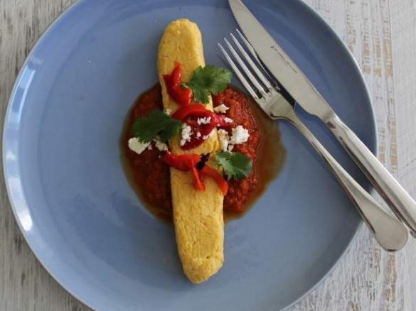 Fresh corn tamales, tomato sauce