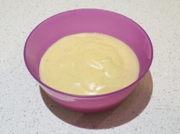 Pouring sugar-free low-fat Vanilla Custard