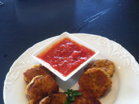 Lentil and pumpkin burgers with roast tomato sauce