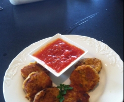 Lentil and pumpkin burgers with roast tomato sauce