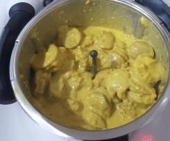 Mums white sauce based curried sausages