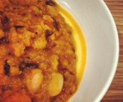 Beans with tomato and basil on polenta