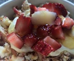 Poached pears with muesli, yoghurt, honey and strawberries