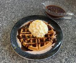 Christmas waffles with dark chocolate Cointreau pouring sauce