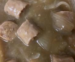 Sausages with onion gravy and vegetables