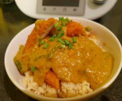 Sweet curry with crumbed chicken on cous cous