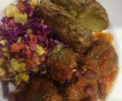 Mexican Meatballs, tomato sauce, baked potato and coleslaw