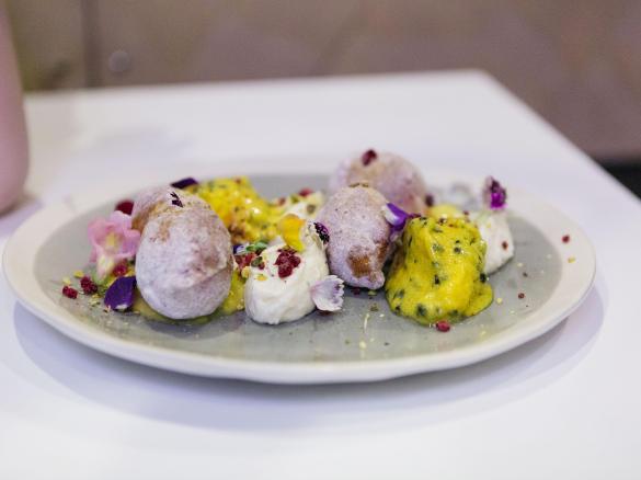 Summer Italian donuts with passionfruit curd, whipped ricotta, spiced sugar, passionfruit gelato, pistachio and freeze dried raspberry crumble - Dominique Rizzo