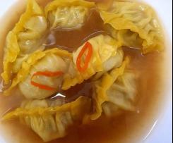 Potsticker dumplings and broth