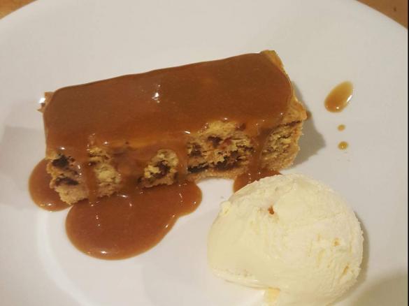 Sticky Date Cheesecake Slice with Caramel Fudge Sauce