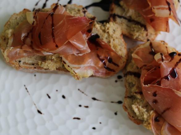 Toasted ciabatta with Truffle Ponzu artichokes and shaved jamon