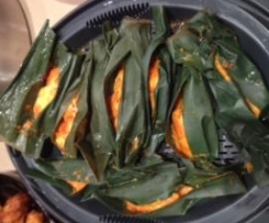 Pepesan Ikan (grilled fish in banana leaves)